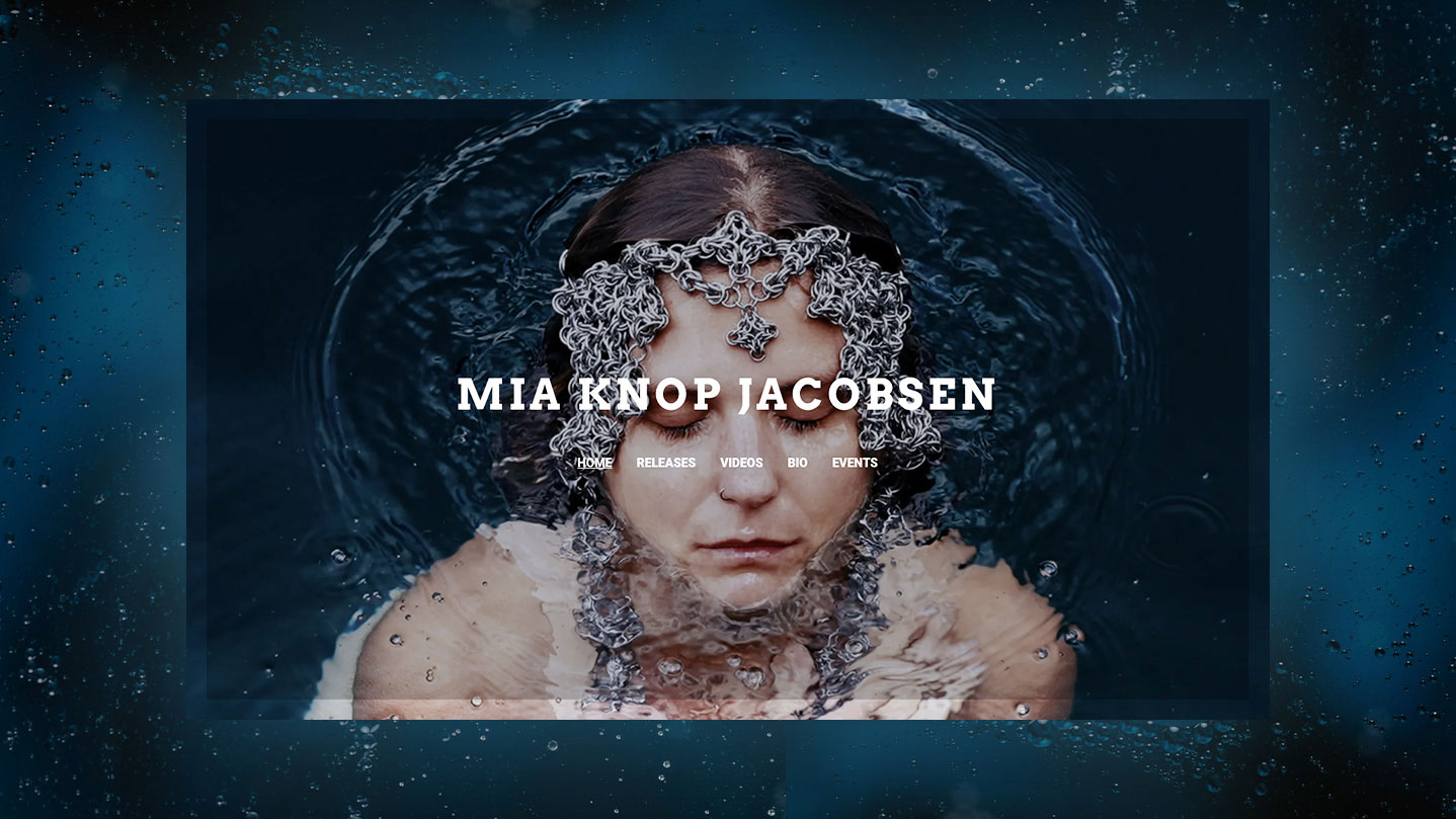 Bandzoogle blog: 10 ways to promote your band. Image of a website header section, featuring artist's name overtop of the navigation menu, with background image of the artist wearing a chainmail headpiece while floating in water.  
